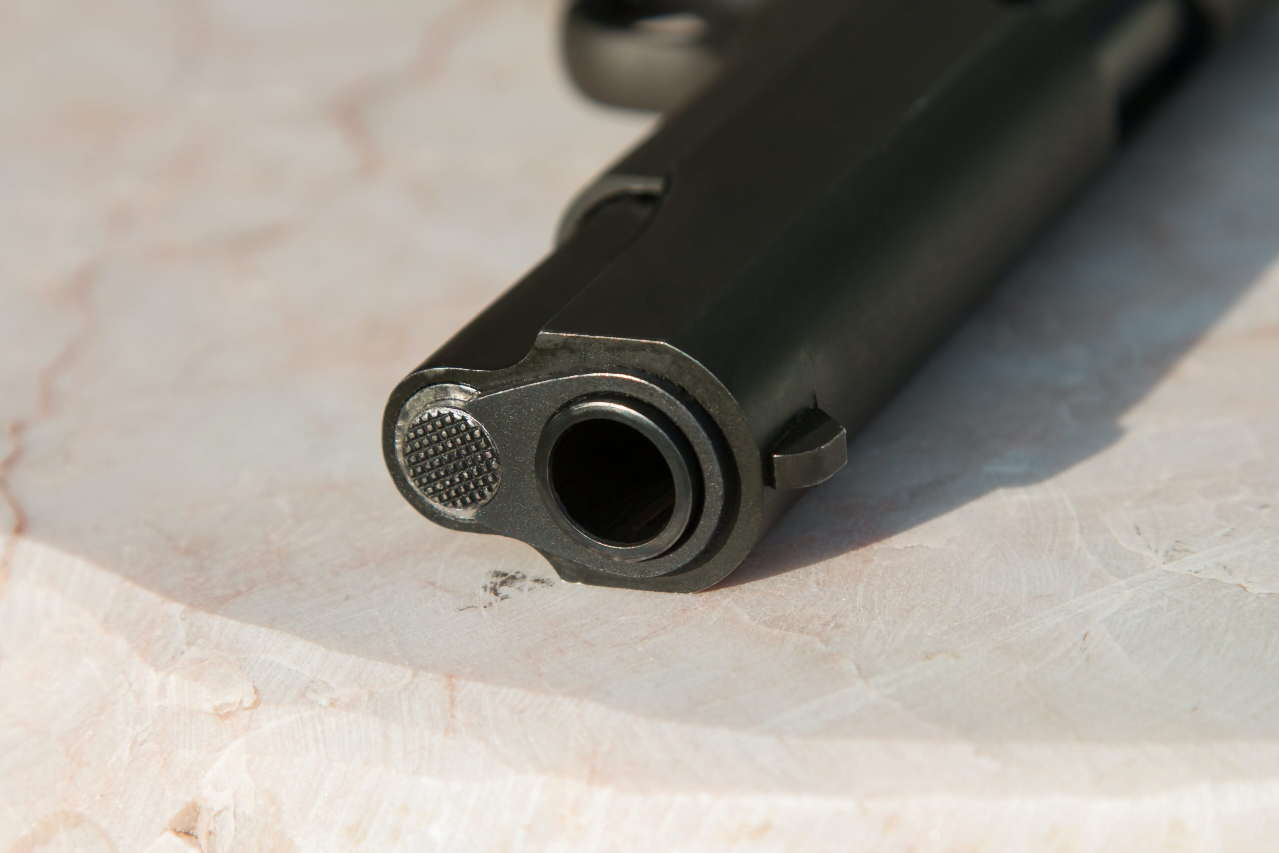 A closeup of the barrel of a gun